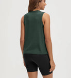 ODODOS Stratum Women's Performance Tank in dark green, athletic fit with breathable soft fabric.