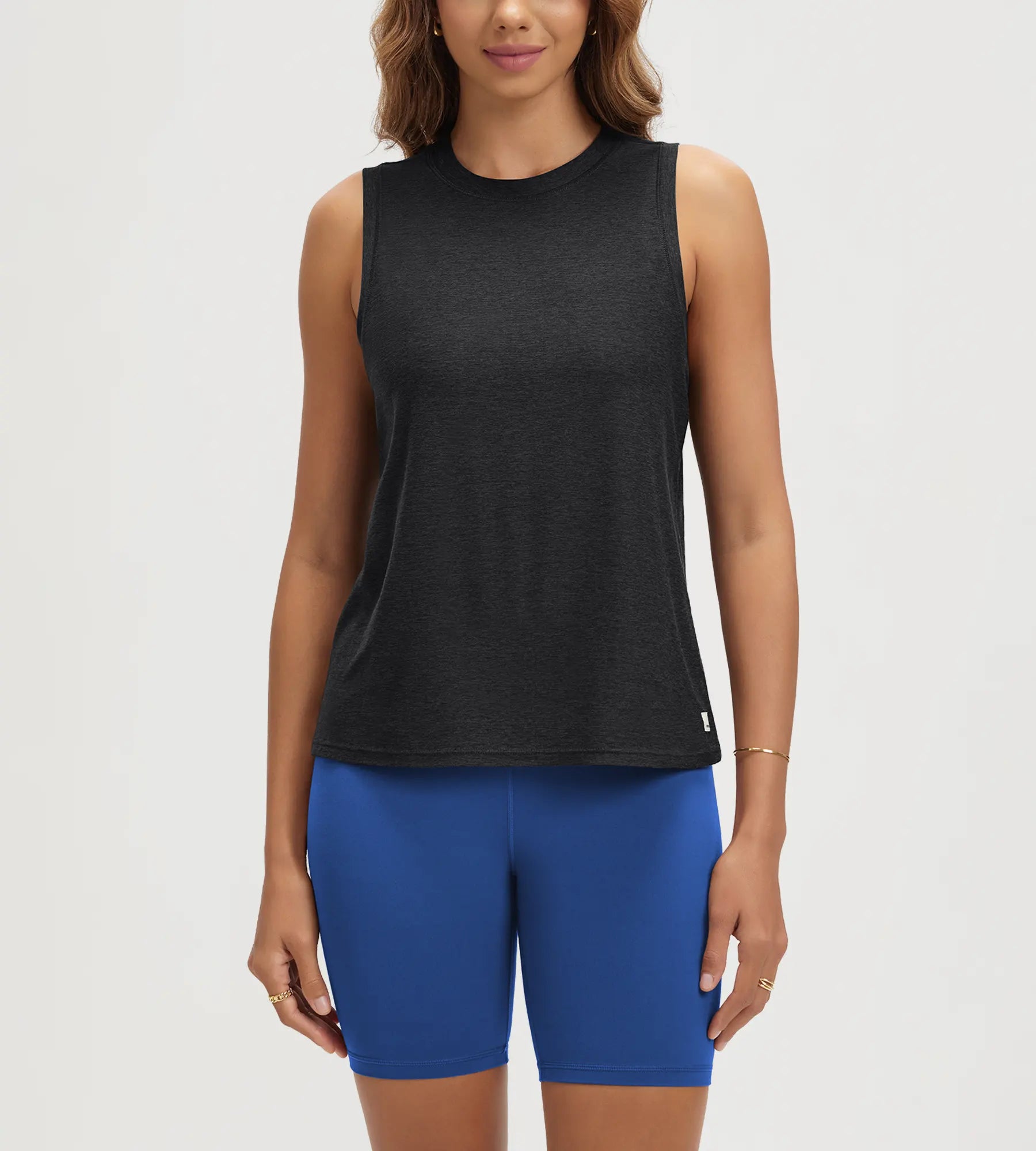 ODODOS Stratum Women's Performance Tank in black, ideal for workout wear and summer essentials.