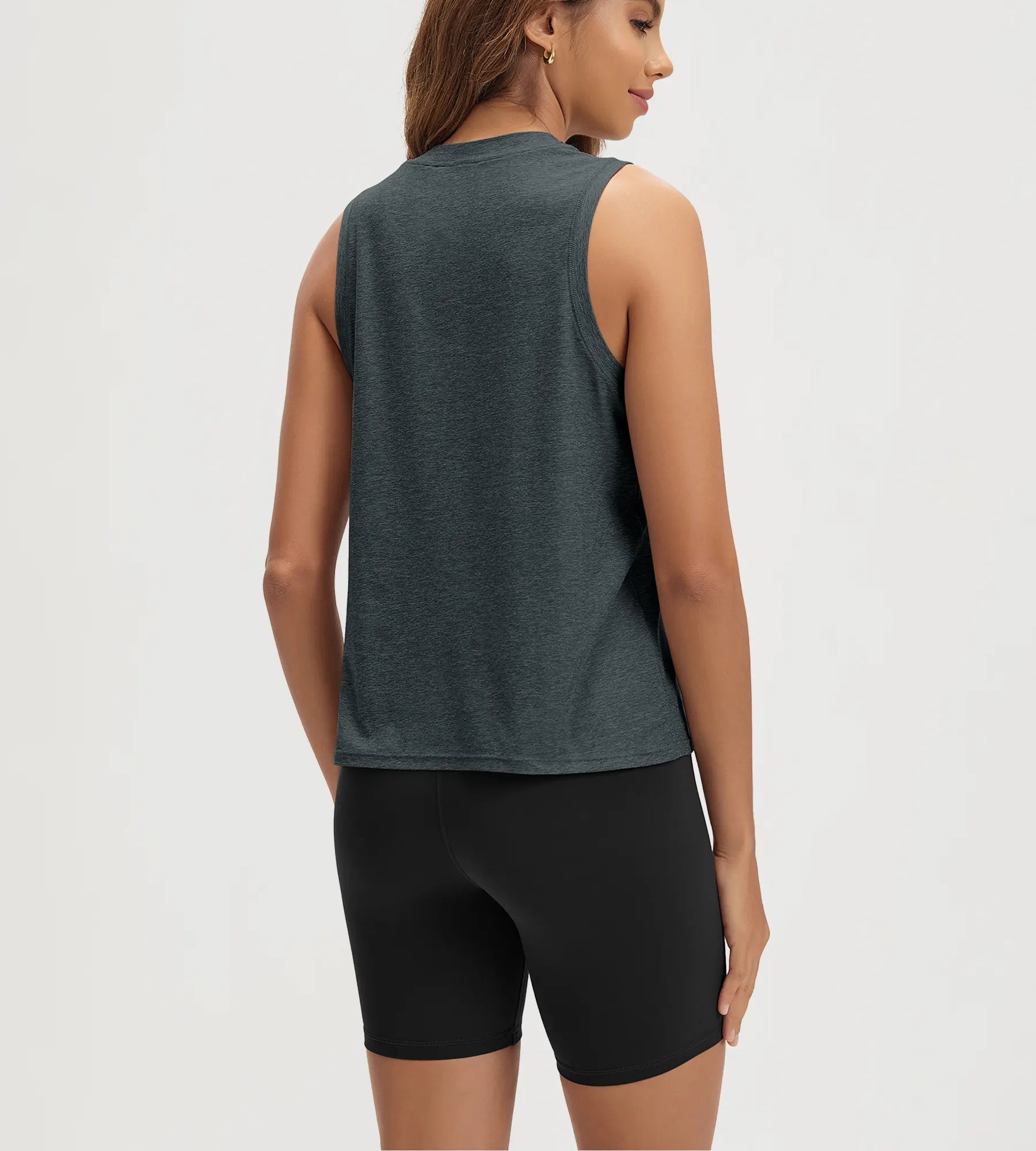 ODODOS Stratum Women's Performance Tank in breathable fabric with loose fit.