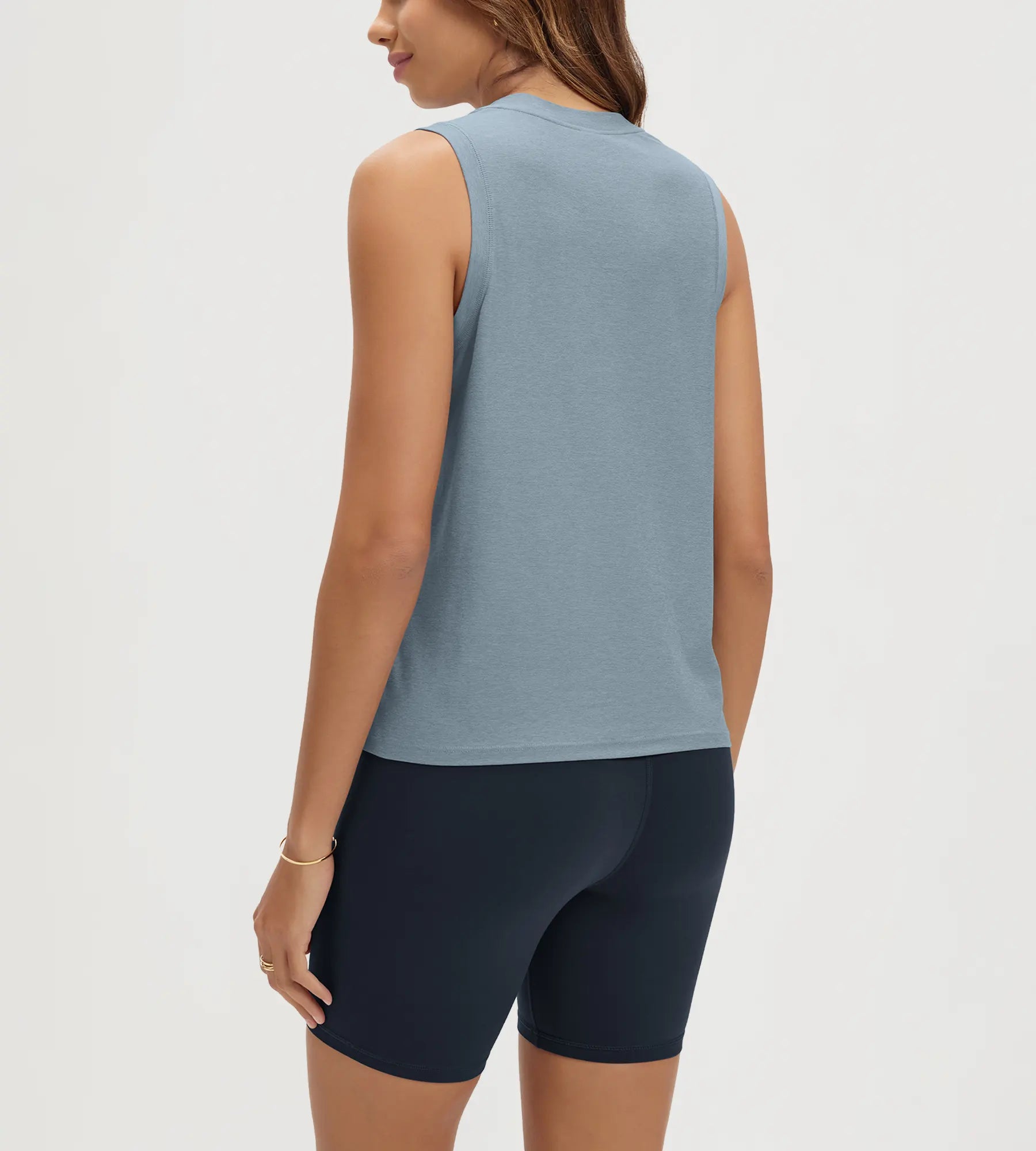 ODODOS Stratum Women's Performance Tank in soft fabric, paired with modal shorts.
