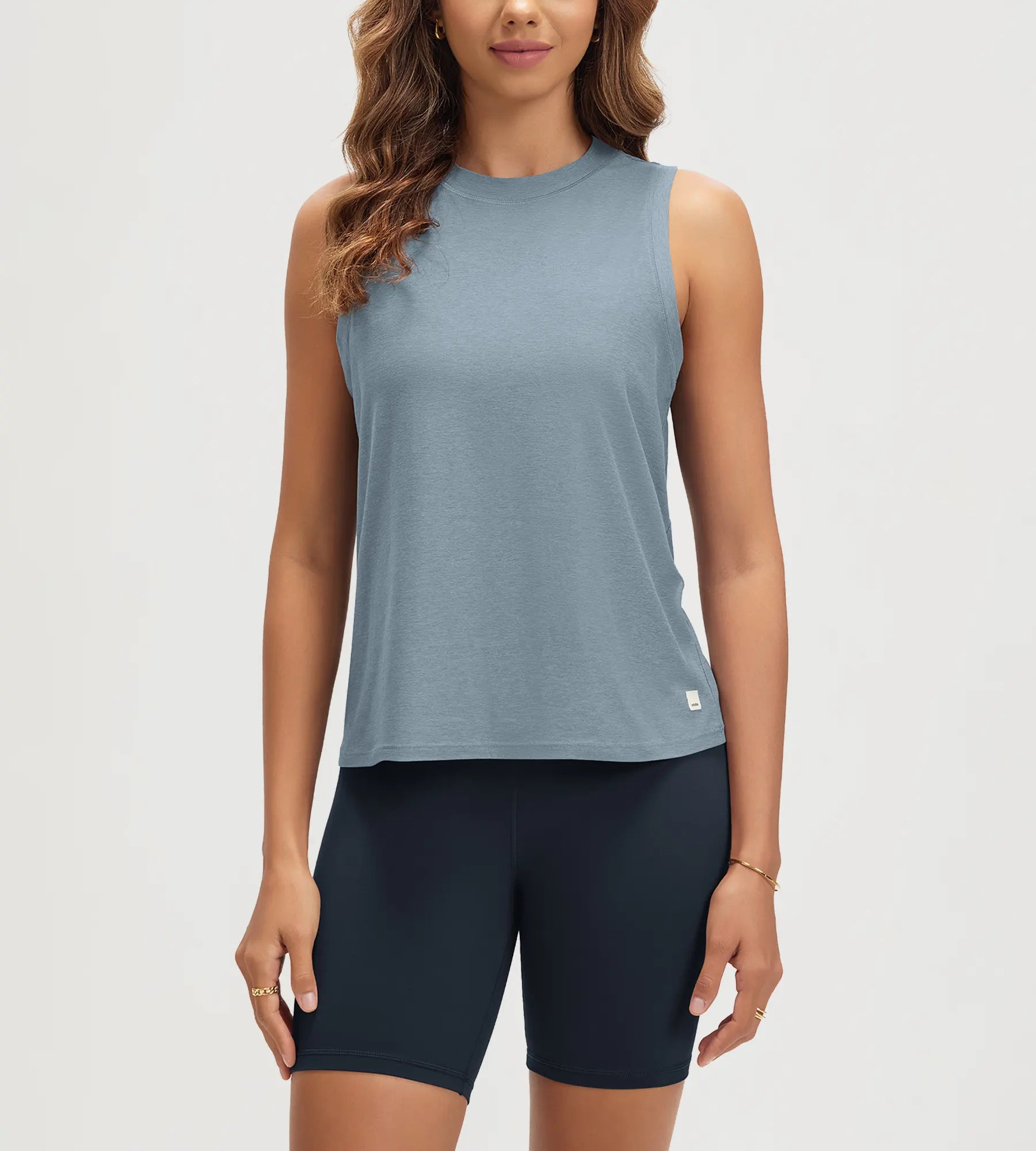 ODODOS Stratum Women's Performance Tank in soft fabric, breathable athletic fit, perfect for workout wear.
