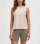 ODODOS Stratum performance tank with soft fabric and athletic fit in light beige.