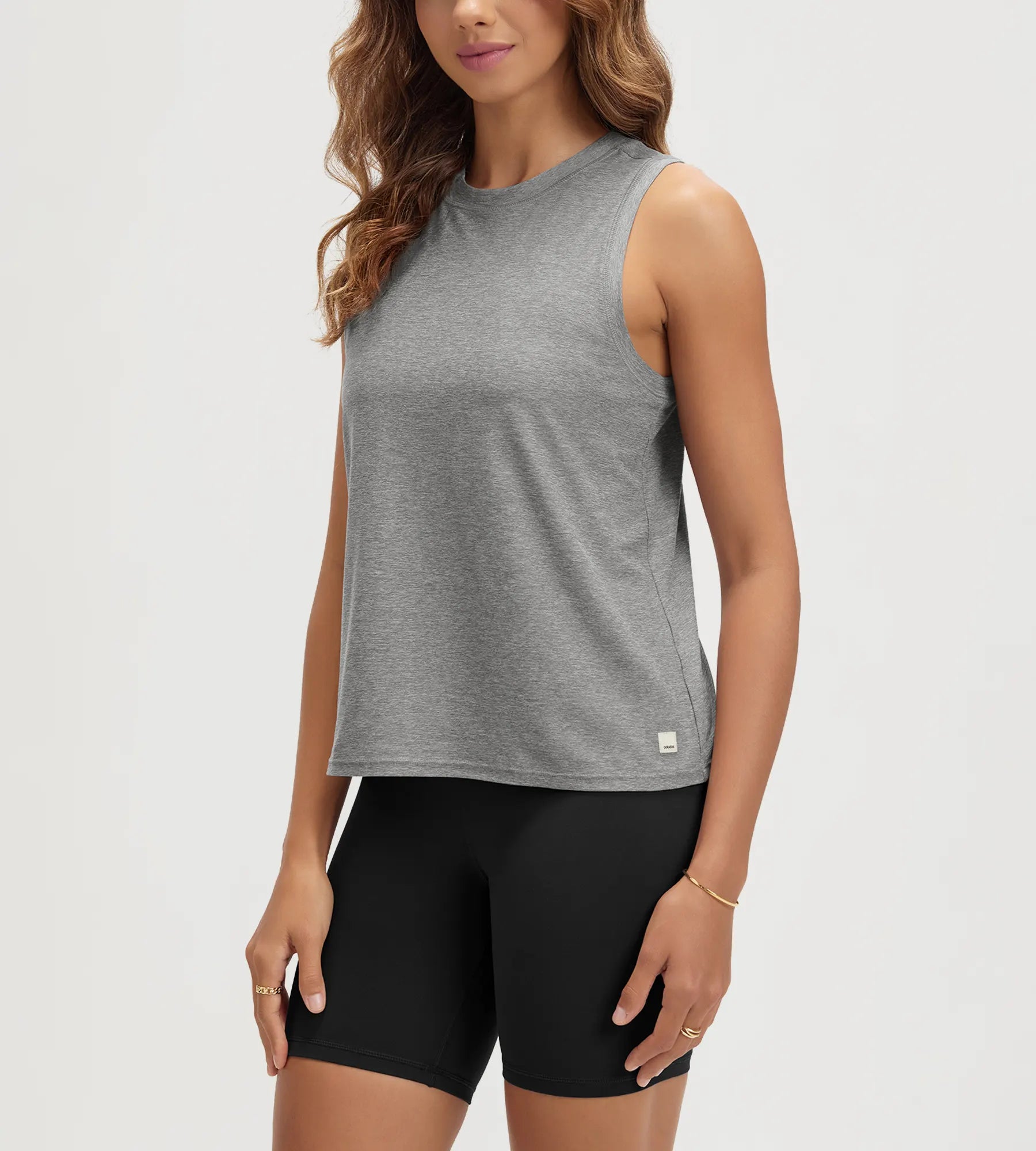 ODODOS Stratum Women's Performance Tank in gray with breathable soft fabric.