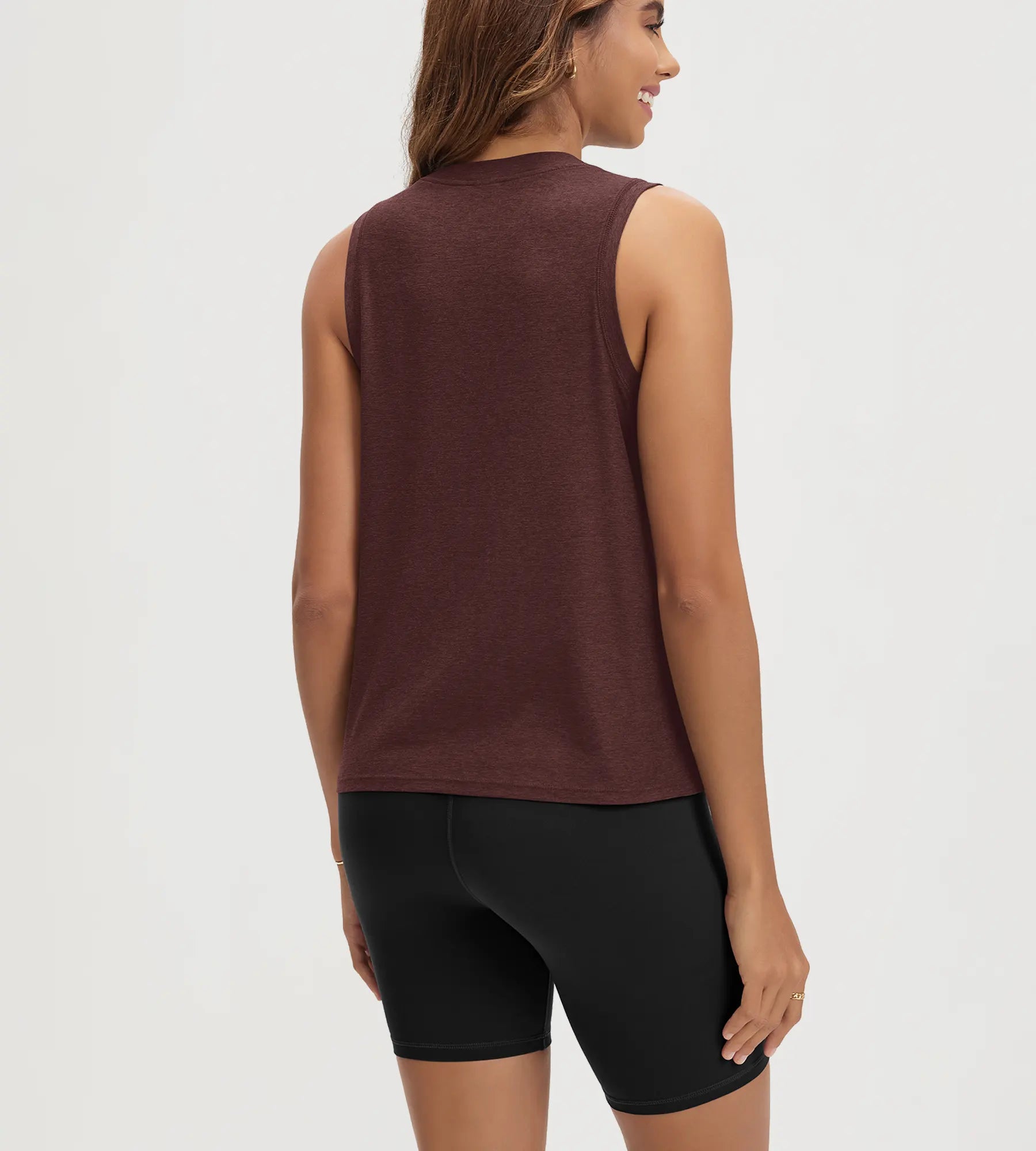 ODODOS Stratum Women's Performance Tank in maroon, showcasing breathable soft fabric and athletic fit.