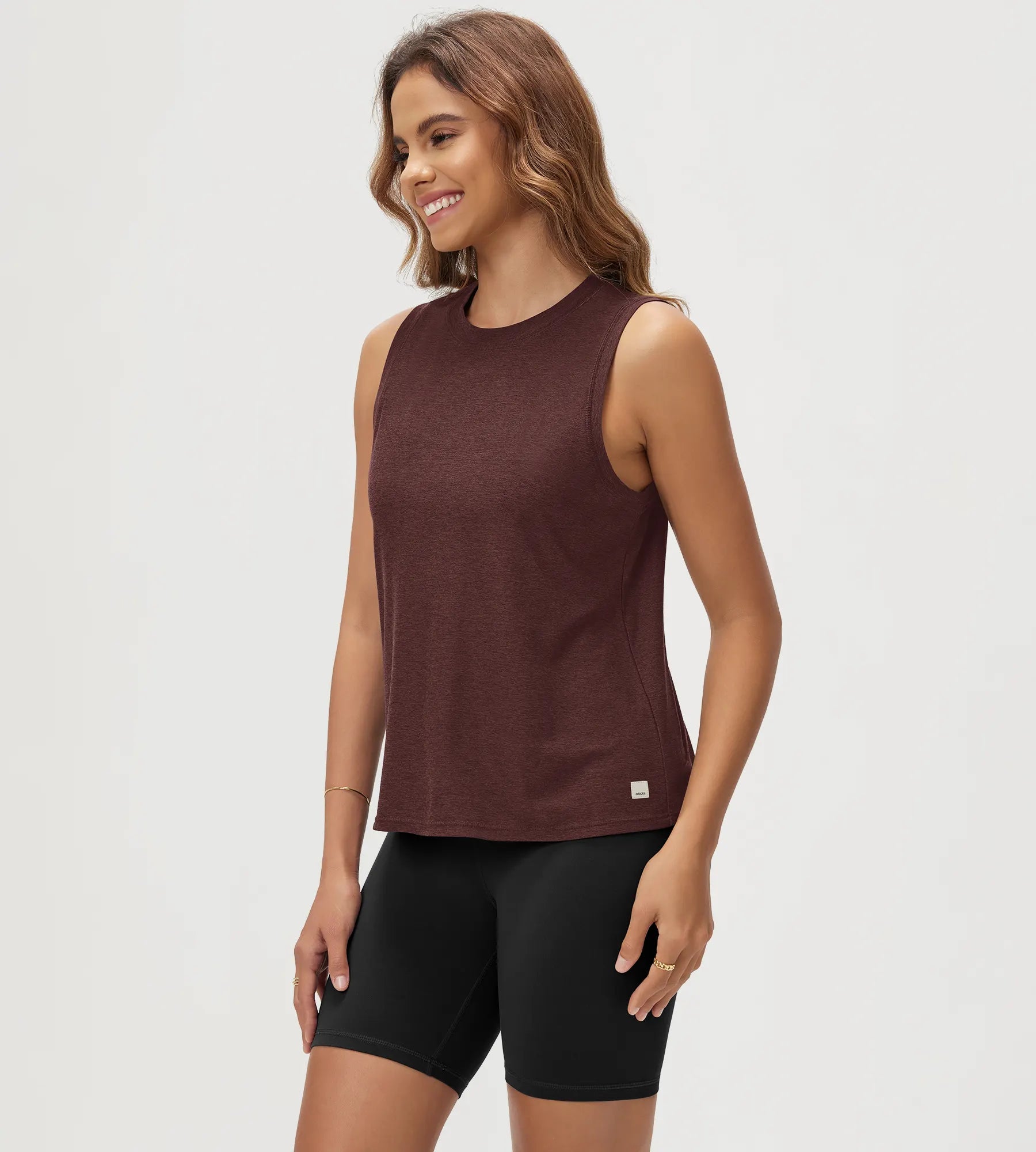 ODODOS Stratum Women's Performance Tank in soft fabric with athletic fit.