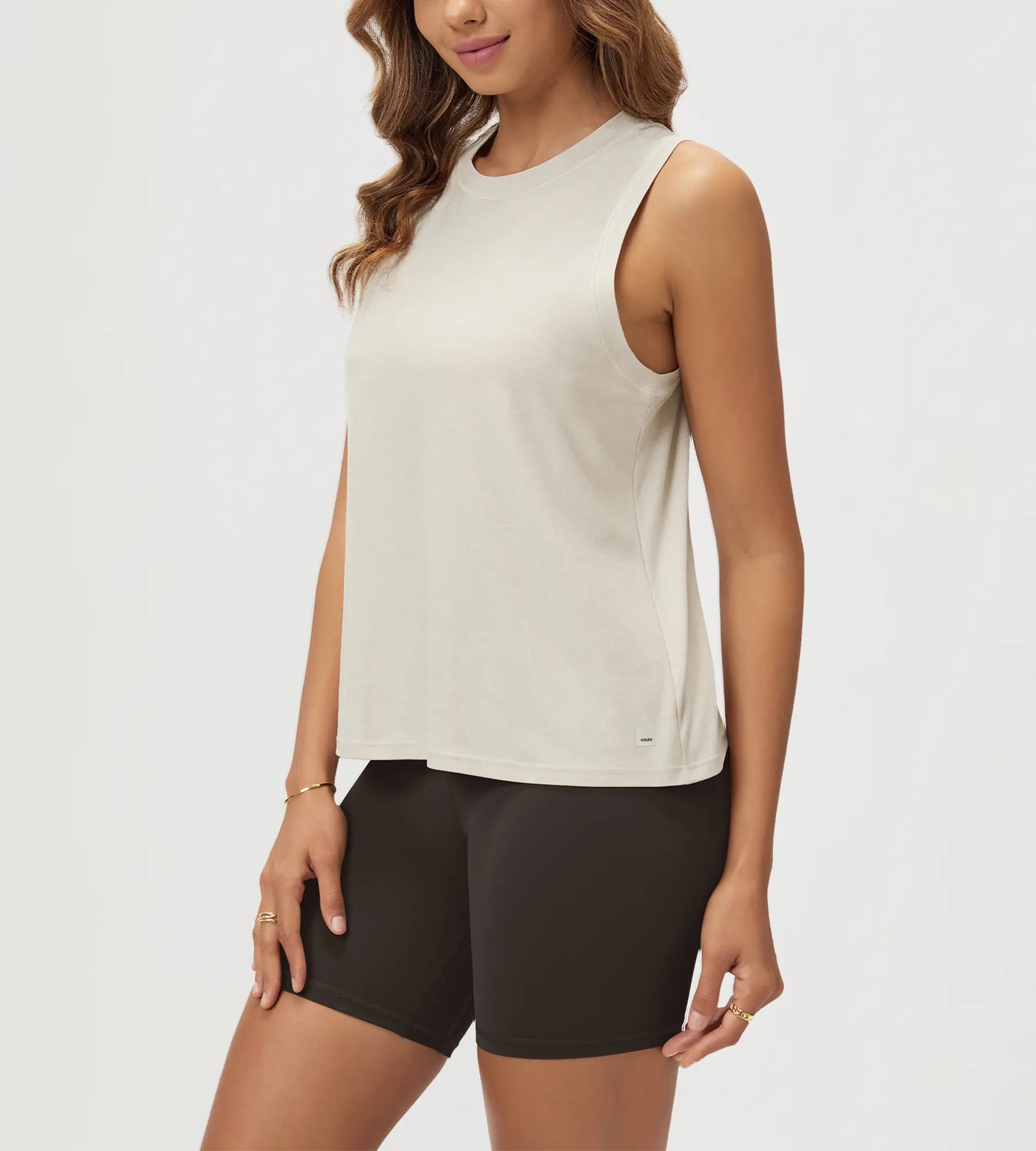 ODODOS Stratum Women's performance tank in soft fabric, perfect for workout wear.