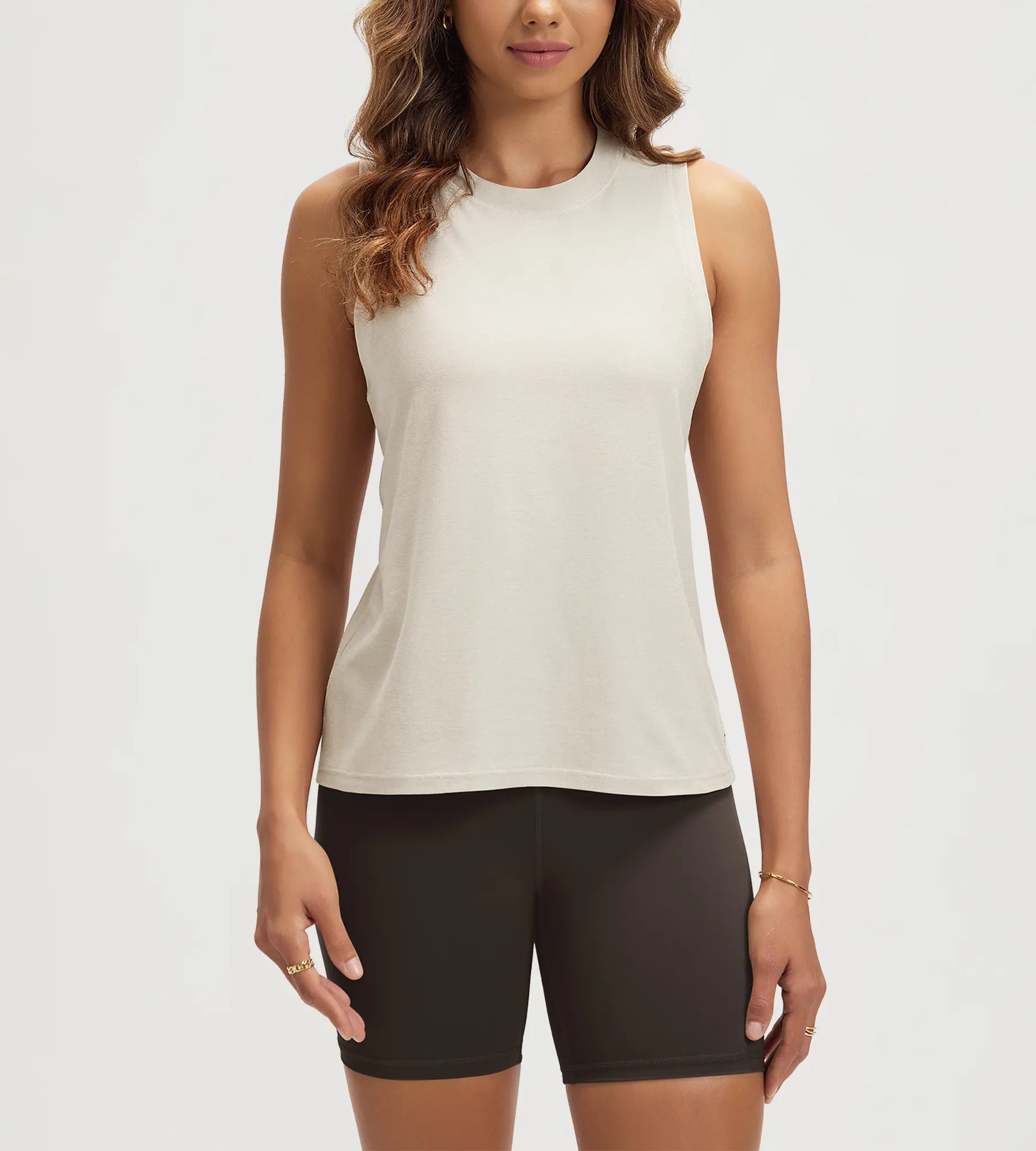 ODODOS Stratum Women's Performance Tank in soft fabric, perfect for workout wear and summer essentials.