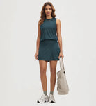 ODODOS Stratum Women's Performance Tank paired with mini skirt and soft fabric.