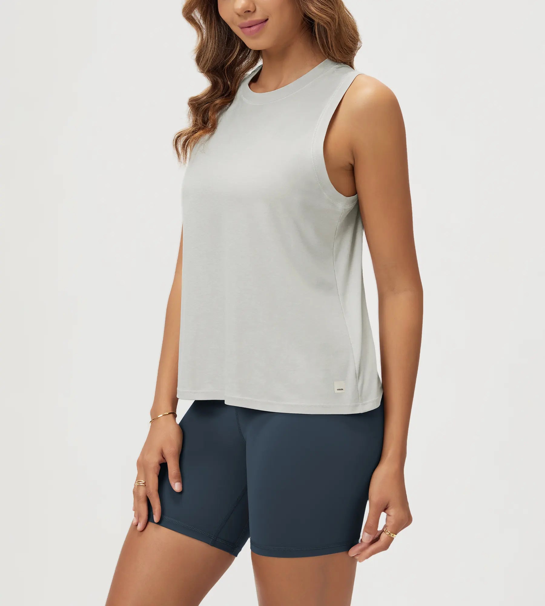 ODODOS Stratum Women's Performance Tank in soft fabric with breathable design.