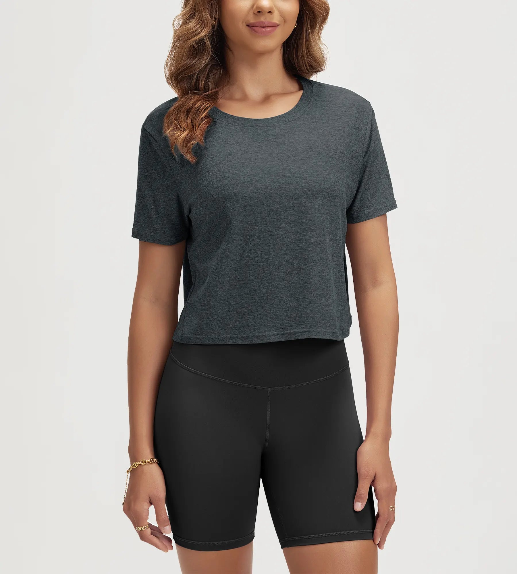 ODODOS Stratum Women's Performance Cropped Tee in soft fabric, perfect for workout wear.