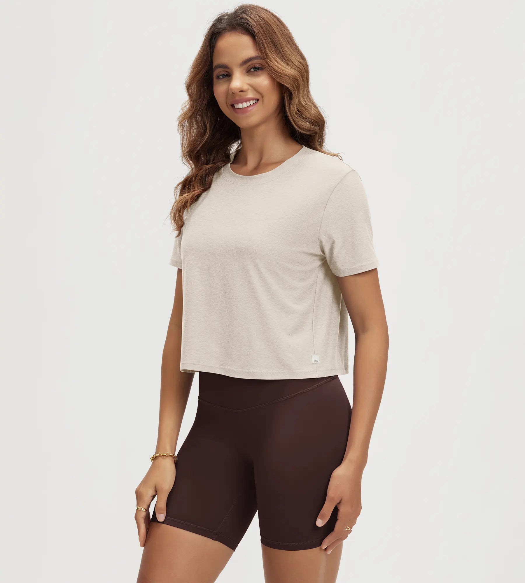 ODODOS Stratum Women's Performance Cropped Tee in soft fabric with athletic fit.