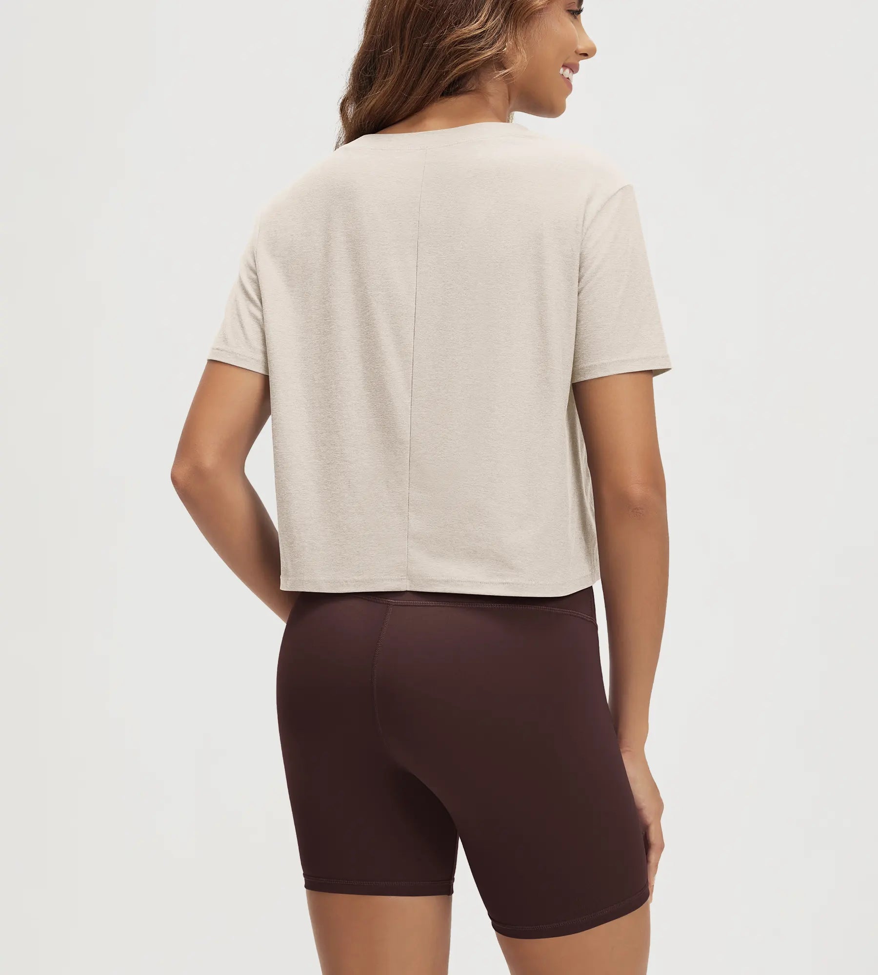 ODODOS Stratum Women's Performance Cropped Tee with soft fabric and athletic fit, paired with modal shorts.