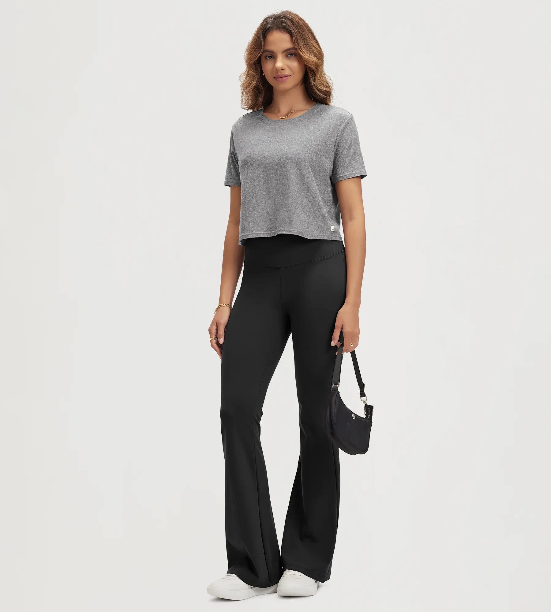 ODODOS Stratum Women's Performance Cropped Tee paired with soft fabric flared pants.