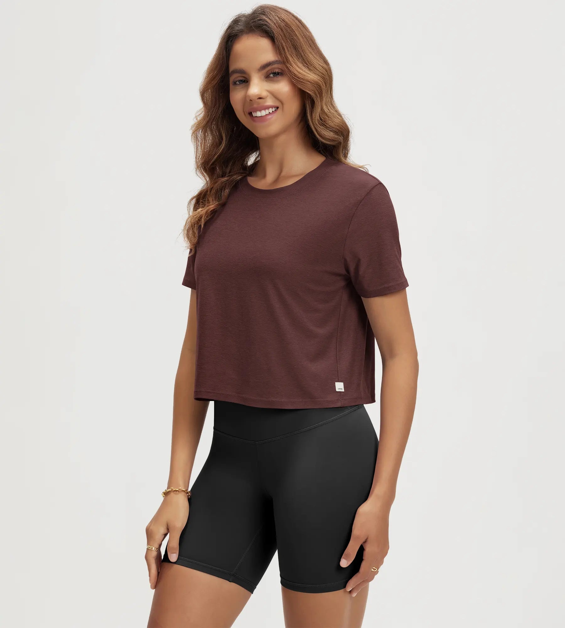 ODODOS Stratum cropped tee in burgundy, perfect for athletic fit and summer workouts.