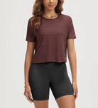 ODODOS Stratum Women's cropped tee in soft fabric paired with breathable shorts.