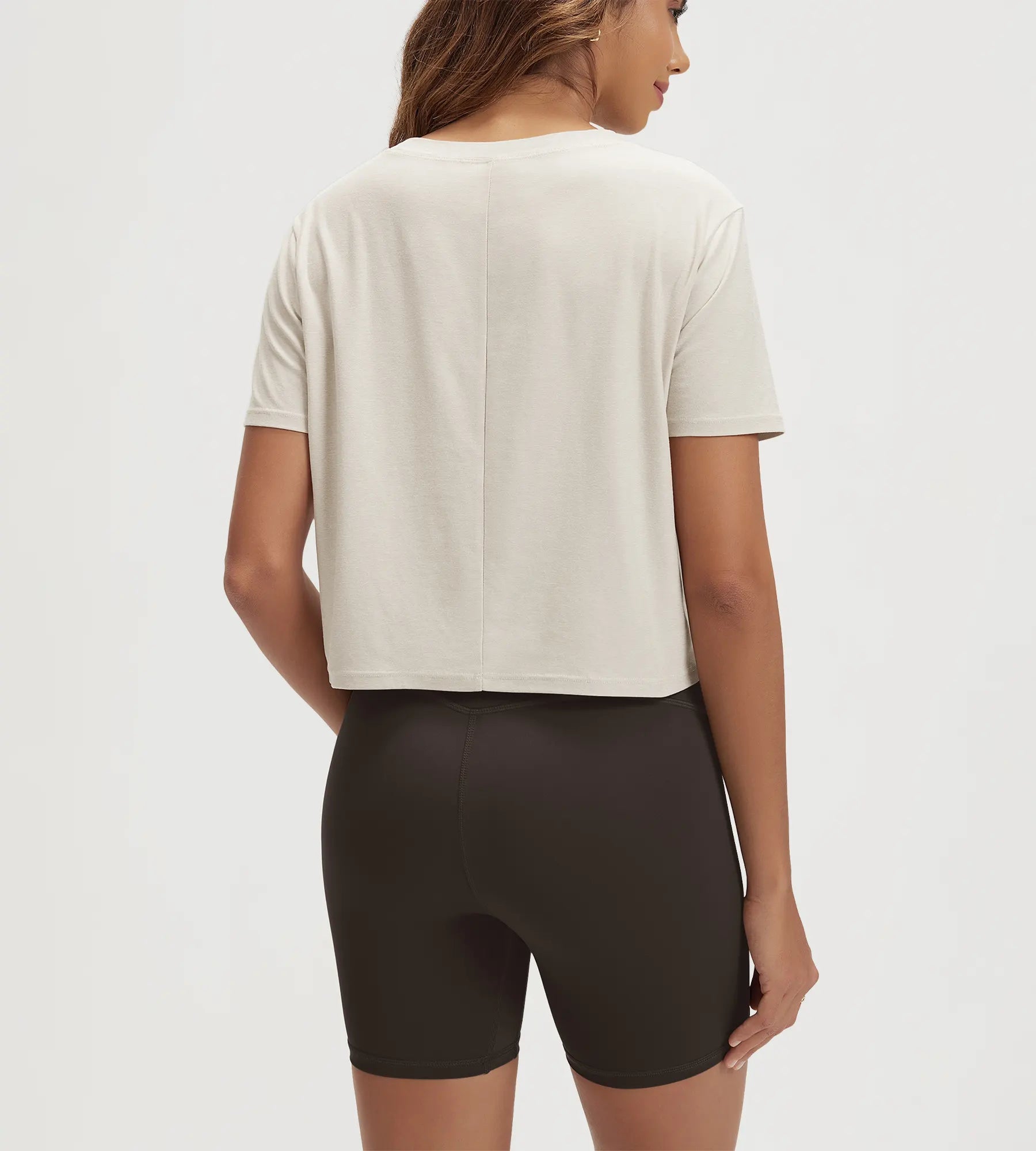 ODODOS Stratum Women's Performance Cropped Tee, soft fabric, athletic fit, perfect for workout wear.