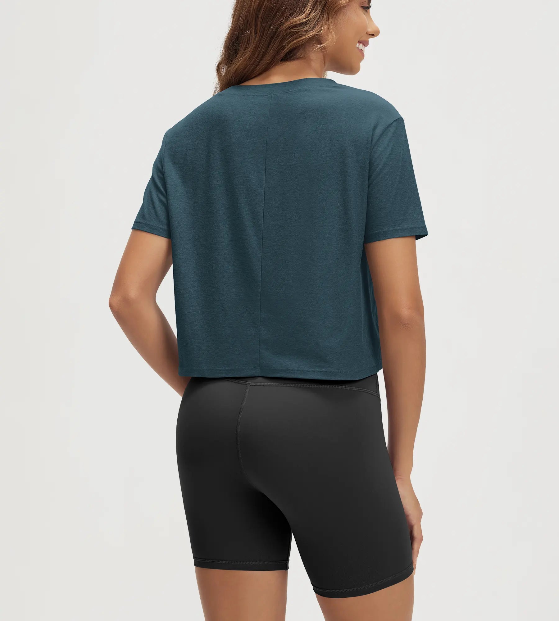 ODODOS Stratum Women's Performance Cropped Tee with soft fabric, perfect for workout wear.