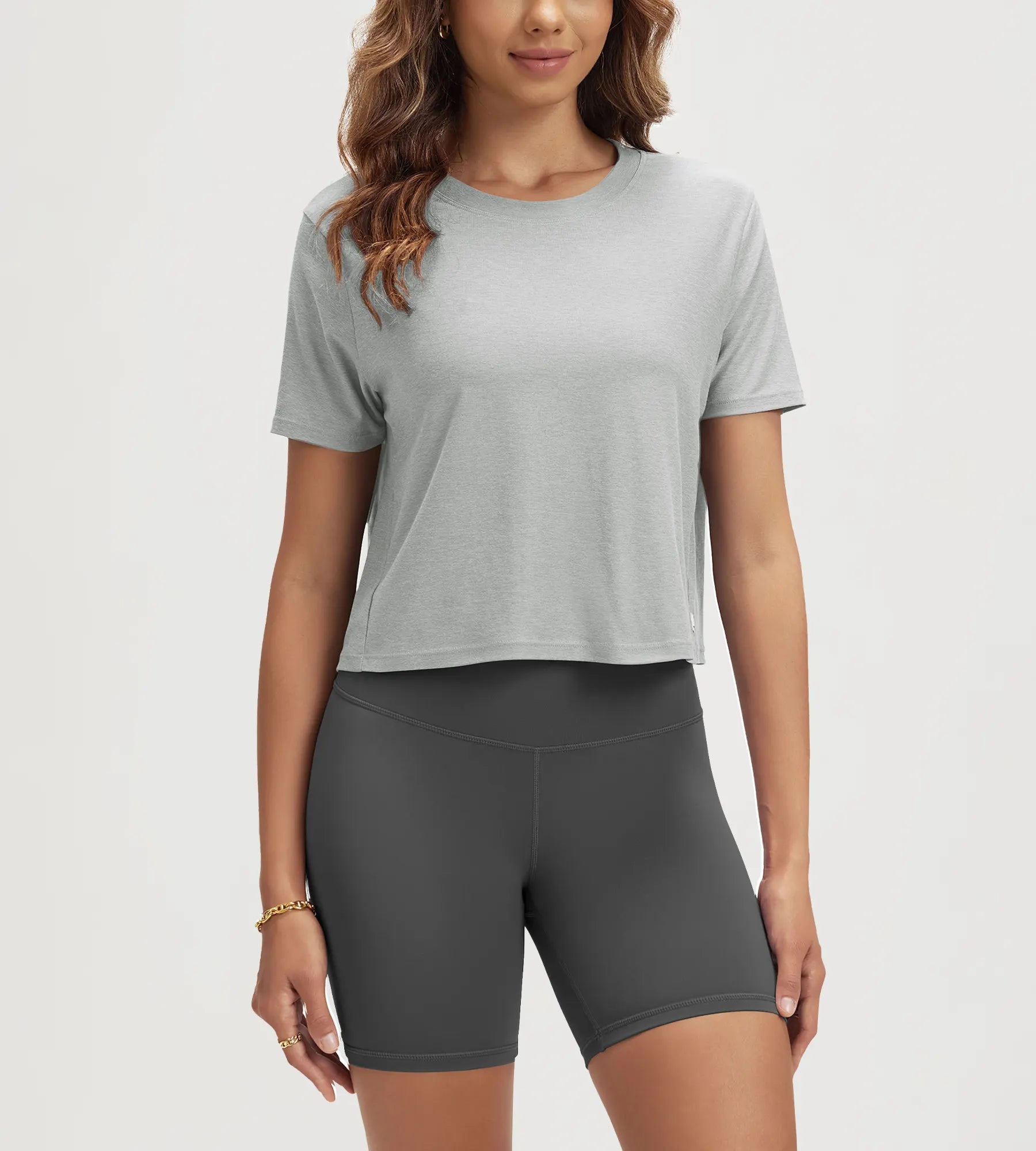 ODODOS Stratum cropped tee paired with athletic shorts for summer workouts.