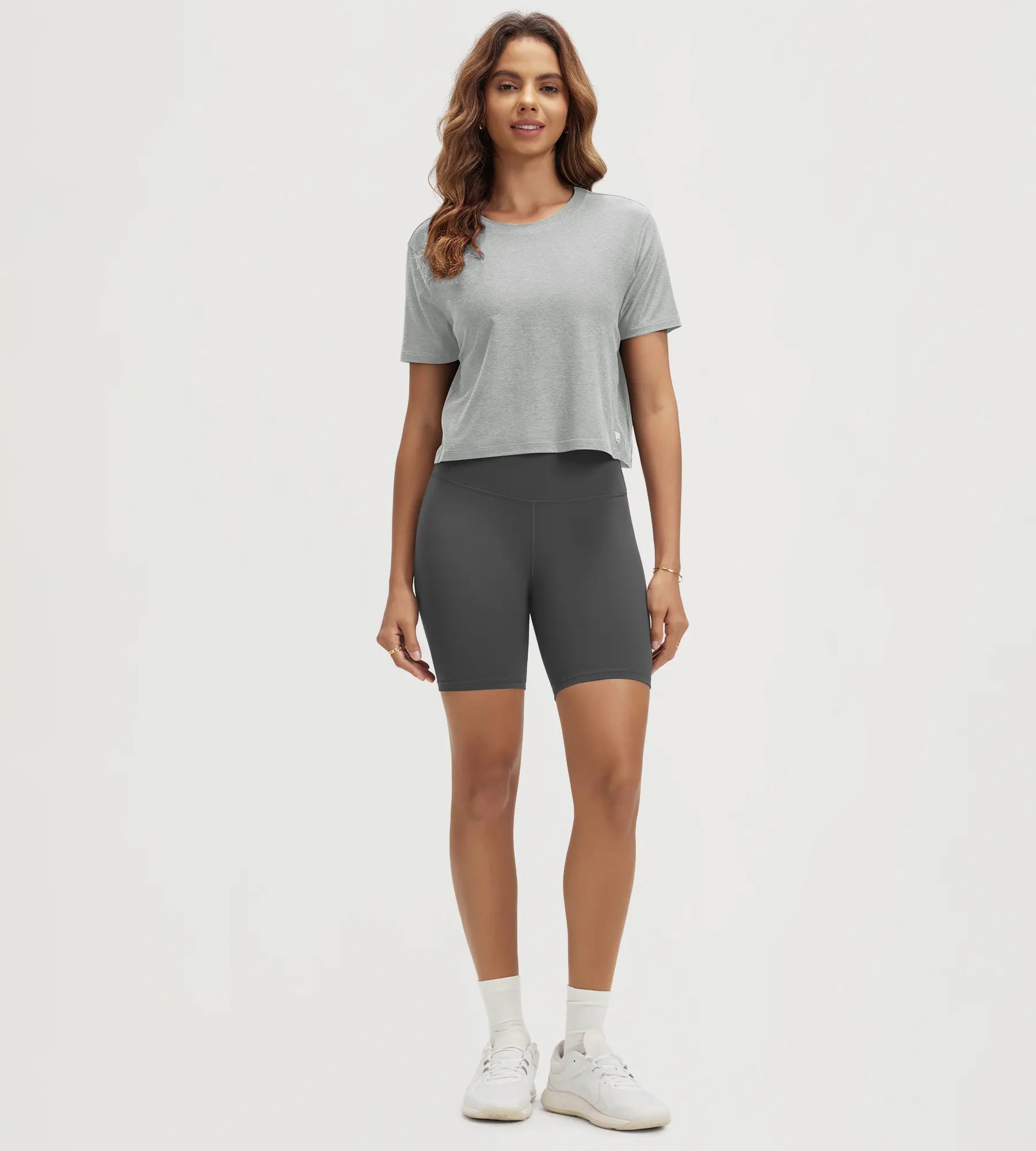 ODODOS Stratum Women's Performance Cropped Tee with breathable shorts for athletic fit.