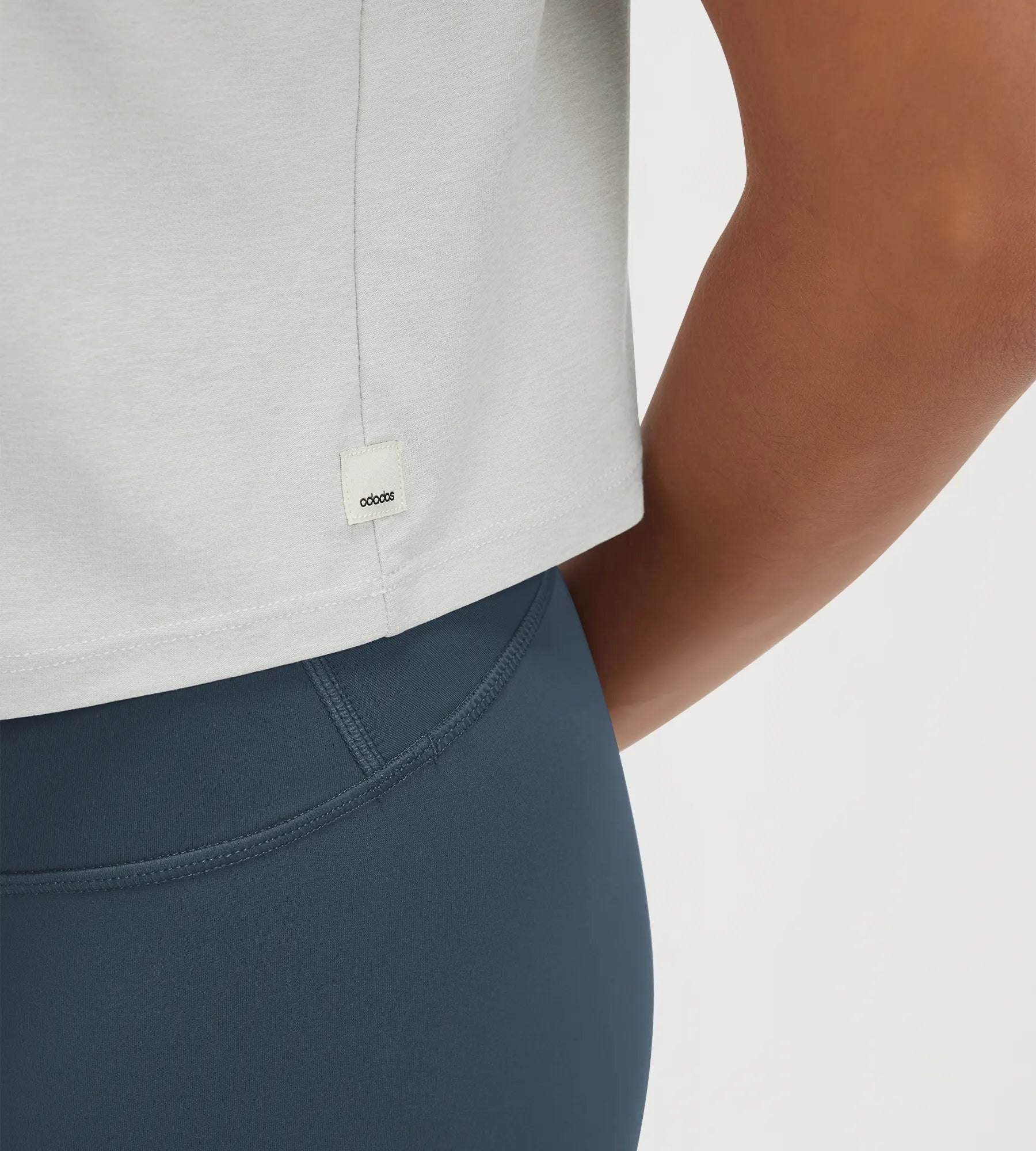 ODODOS Stratum Women's Performance Cropped Tee featuring breathable soft fabric for workout wear.