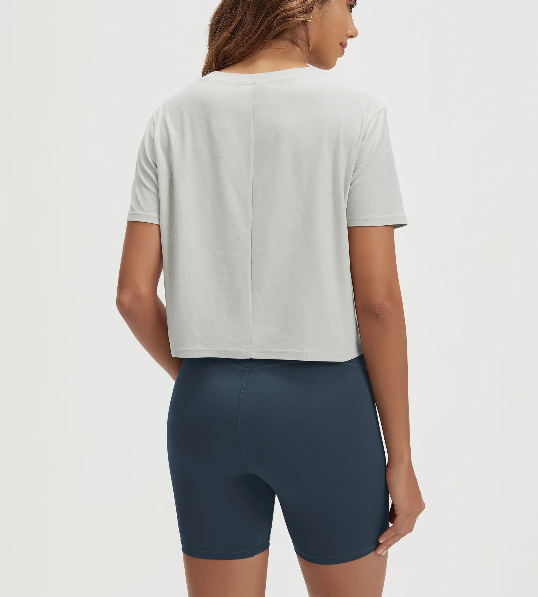 ODODOS Stratum Women's Performance Cropped Tee with soft fabric and athletic fit.