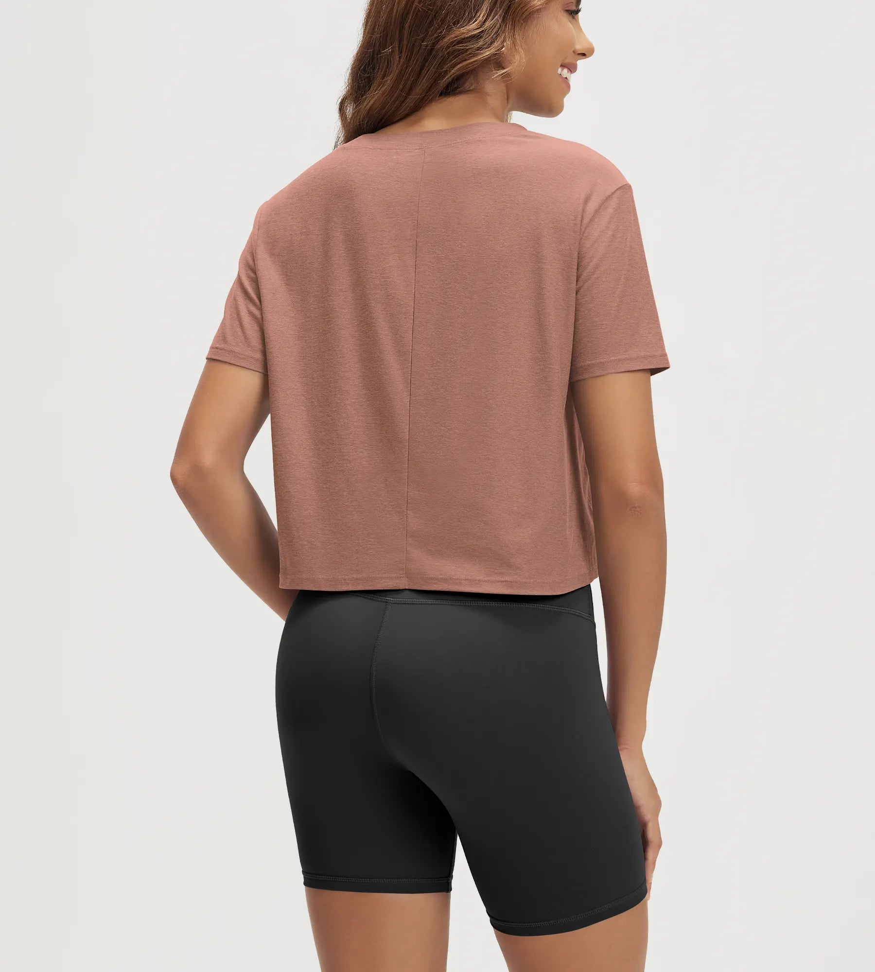 ODODOS Stratum Women's performance cropped tee showcasing soft fabric and athletic fit with modal shorts.